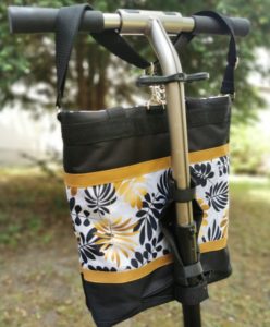 Arany-fekete leveles rolleres táska